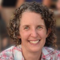Mirjam Kaestli head and shoulders with blurred background