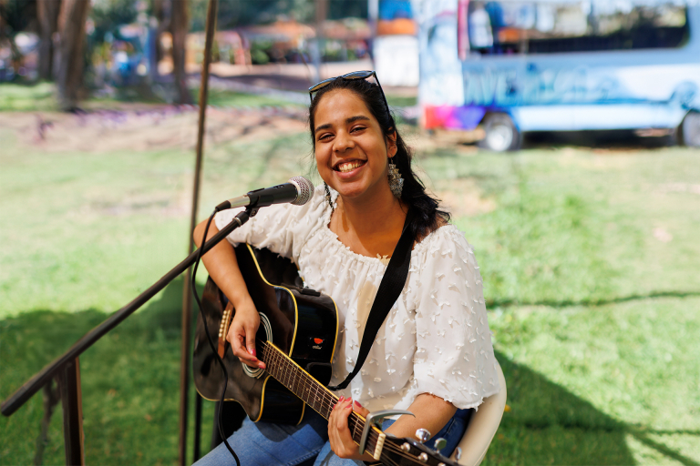 Artist performing at Open Day