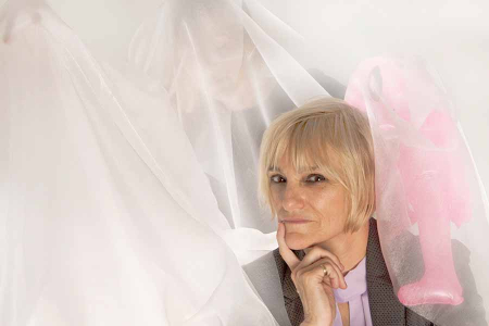 Dr Krissy Wilson considers the paranormal with a ghost and alien in the background.