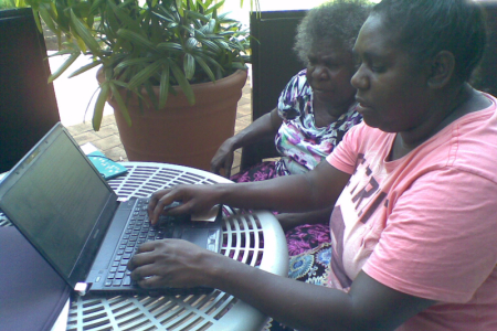 Indigenous woman on a computer