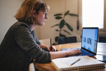 Woman looking at her laptop