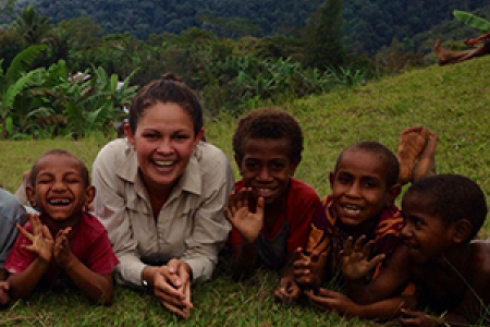 Indigenous youth leader Joelene Puntoriero donates educational materials to an orphanage near the Kokoda Track in Papua New Guinea