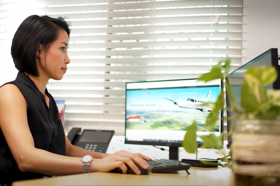 Ellie working at the office