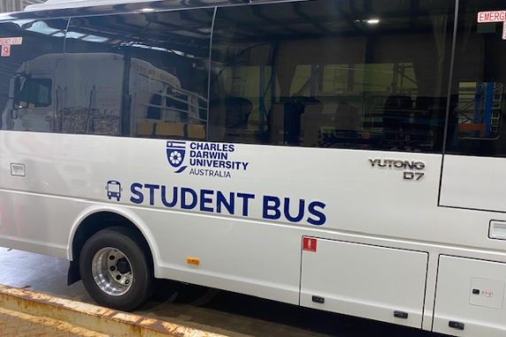 Bus with CDU logo and student bus printed on the side