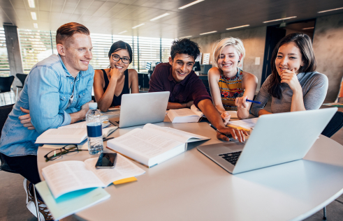 Group of students sitting at table