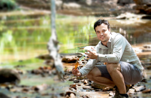 Taking research samples in river