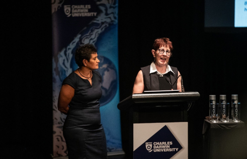 Sue Kildea presenting a professorial lecture with Dr. Yvette Roe