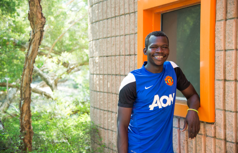 CDU student Felix Oryema smiling