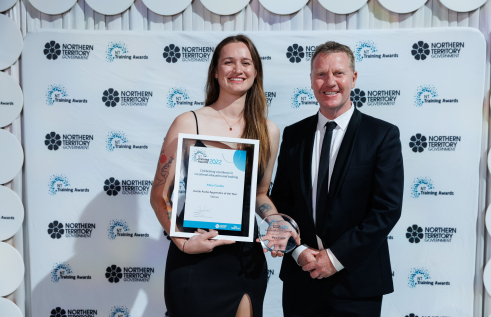 Charles Darwin University (CDU) students were among the honourees at the Northern Territory Training Awards gala held on September 3 at the Darwin Convention Centre. Pictured; Austin Asche Apprentice of the year award winner Mary Coulter and Minister for Business, Jobs and Training, Paul Kirby.
