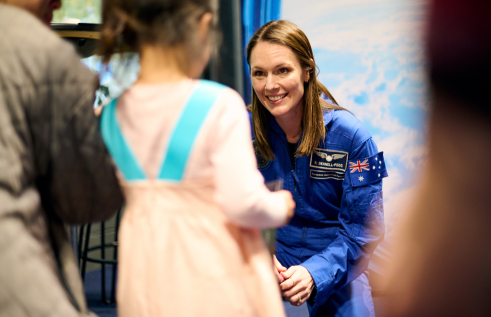 Australian Astronaut greets child